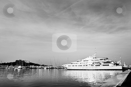 To use this stock image in your creative project, please select the size you need over to the right and click the "Add to Cart" button.
Your downloaded image will come with the Cutcaster watermark removed so don’t worry about the watermark you see on this page. Antibes #285 stock photo, A harbor in Antibes, France. Black and white. Copy space. by Sean Nel