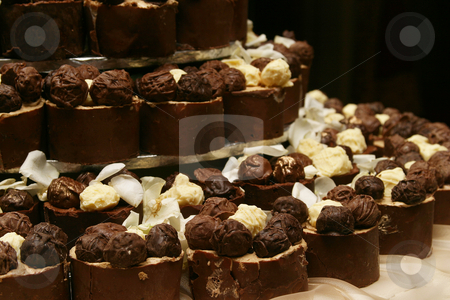 To use this stock image in your creative project, please select the size you need over to the right and click the "Add to Cart" button.
Your downloaded image will come with the Cutcaster watermark removed so don’t worry about the watermark you see on this page. Chocolate truffles stock photo, Chocolate truffles as a wedding cake by Sean Nel
