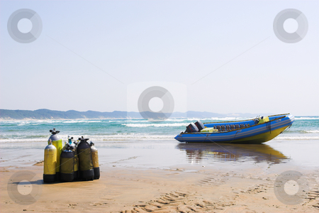 To use this stock image in your creative project, please select the size you need over to the right and click the "Add to Cart" button.
Your downloaded image will come with the Cutcaster watermark removed so don’t worry about the watermark you see on this page. Sudwana #24 stock photo, The beach at Sudwana with diving equipment in the foreground and a motorboat in the background by Sean Nel
