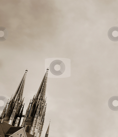 To use this stock image in your creative project, please select the size you need over to the right and click the "Add to Cart" button.
Your downloaded image will come with the Cutcaster watermark removed so don’t worry about the watermark you see on this page. Spires of the Dom stock photo, Cathedral steeples of The Dom Cathedral in Regensburg, Germany during a sunny day in winter. Black and White by Sean Nel