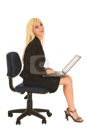 To use this stock image in your creative project, please select the size you need over to the right and click the "Add to Cart" button.
Your downloaded image will come with the Cutcaster watermark removed so don’t worry about the watermark you see on this page. Business Woman in black #134 stock photo, Blond business woman in black dress business suit, sitting down, with notebook computer on her lap by Sean Nel