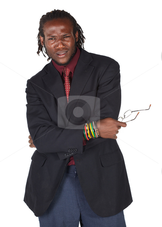 To use this stock image in your creative project, please select the size you need over to the right and click the "Add to Cart" button.
Your downloaded image will come with the Cutcaster watermark removed so don’t worry about the watermark you see on this page. Handsome African businessman stock photo, Handsome African businessman in colorful suit holding his glasses on white background. NOT ISOLATED by Sean Nel