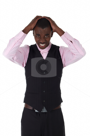 To use this stock image in your creative project, please select the size you need over to the right and click the "Add to Cart" button.
Your downloaded image will come with the Cutcaster watermark removed so don’t worry about the watermark you see on this page. Black African businessman stock photo, Young Adult black african businessman wearing a dark smart-casual outfit without a Jacket, but with a pink shirt and a dark waistcoat on a white background in various poses with various facial expressions. Part of a series, Not Isolated. by Sean Nel