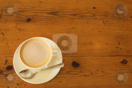 To use this stock image in your creative project, please select the size you need over to the right and click the "Add to Cart" button.
Your downloaded image will come with the Cutcaster watermark removed so don’t worry about the watermark you see on this page. Lunch #34 stock photo, A cup of coffee on a wooden table by Sean Nel