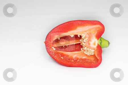 To use this stock image in your creative project, please select the size you need over to the right and click the "Add to Cart" button.
Your downloaded image will come with the Cutcaster watermark removed so don’t worry about the watermark you see on this page. Peppers #1 stock photo, Red Pepper cut in half by Sean Nel