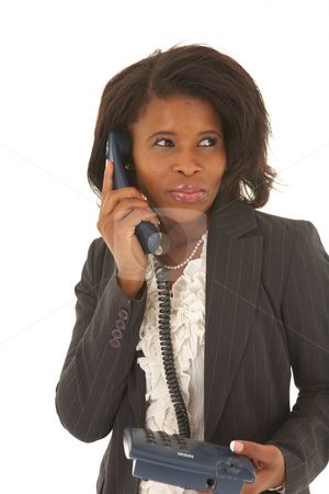 To use this stock image in your creative project, please select the size you need over to the right and click the "Add to Cart" button.
Your downloaded image will come with the Cutcaster watermark removed so don’t worry about the watermark you see on this page. Beautiful African businesswoman stock photo, Portrait of a beautiful young African businesswoman talking on the phone on white background. NOT ISOLATED by Sean Nel