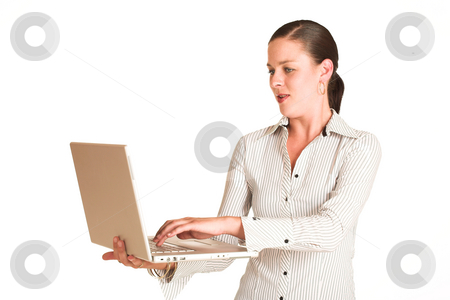 To use this stock image in your creative project, please select the size you need over to the right and click the "Add to Cart" button.
Your downloaded image will come with the Cutcaster watermark removed so don’t worry about the watermark you see on this page. Business Woman #36 stock photo, Business woman dressed in a white pinstripe shirt. Working on laptop. copy space by Sean Nel