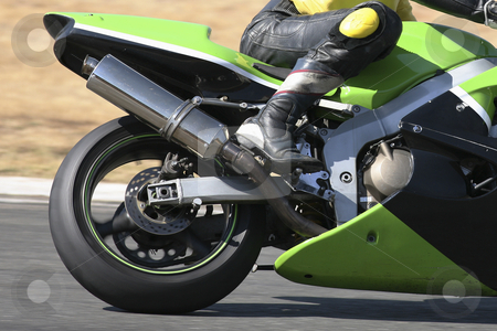 To use this stock image in your creative project, please select the size you need over to the right and click the "Add to Cart" button.
Your downloaded image will come with the Cutcaster watermark removed so don’t worry about the watermark you see on this page. Superbike #94 stock photo, High speed Superbike on the circuit by Sean Nel