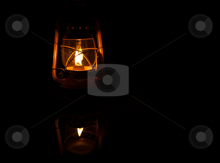 To use this stock image in your creative project, please select the size you need over to the right and click the "Add to Cart" button.
Your downloaded image will come with the Cutcaster watermark removed so don’t worry about the watermark you see on this page. Storm Lantern stock photo, Yellow storm lantern burning at night on a wet table by Sean Nel