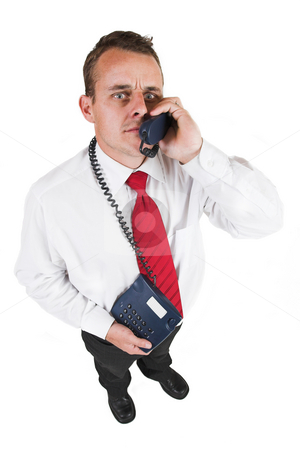 To use this stock image in your creative project, please select the size you need over to the right and click the "Add to Cart" button.
Your downloaded image will come with the Cutcaster watermark removed so don’t worry about the watermark you see on this page. Tollie Booysen #24 stock photo, Businessman in blacktrousers, pants, white shirt and red tie.Talking on the phone, looking up. by Sean Nel
