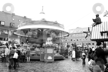 To use this stock image in your creative project, please select the size you need over to the right and click the "Add to Cart" button.
Your downloaded image will come with the Cutcaster watermark removed so don’t worry about the watermark you see on this page. Merry-go-round stock photo, Merry-go-round in Neurenburg - Munich at Christmas time. Movement on people and merry-go-round. Black-and-white. by Sean Nel