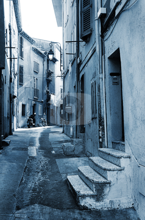 To use this stock image in your creative project, please select the size you need over to the right and click the "Add to Cart" button.
Your downloaded image will come with the Cutcaster watermark removed so don’t worry about the watermark you see on this page. Street in Cannes stock photo, Street with old buildings in Cannes, France. Blue tone by Sean Nel