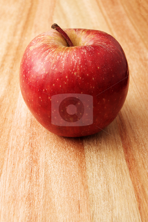 To use this stock image in your creative project, please select the size you need over to the right and click the "Add to Cart" button.
Your downloaded image will come with the Cutcaster watermark removed so don’t worry about the watermark you see on this page. Apple #4 stock photo, Red apple on wooden cutting board - copy space by Sean Nel