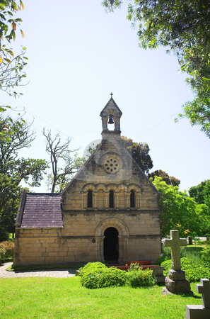 To use this stock image in your creative project, please select the size you need over to the right and click the "Add to Cart" button.
Your downloaded image will come with the Cutcaster watermark removed so don’t worry about the watermark you see on this page. Old church with a cemetery stock photo, Old church in Knysna, South Africa, with a cemetery in green gardens by Sean Nel