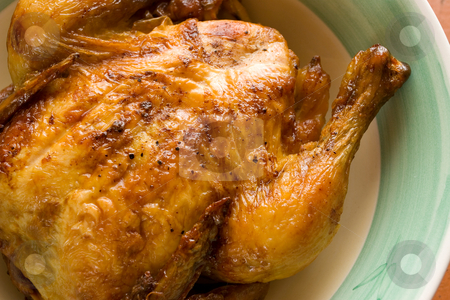 To use this stock image in your creative project, please select the size you need over to the right and click the "Add to Cart" button.
Your downloaded image will come with the Cutcaster watermark removed so don’t worry about the watermark you see on this page. Chicken #3 stock photo, Prepared whole chicken on a plate by Sean Nel