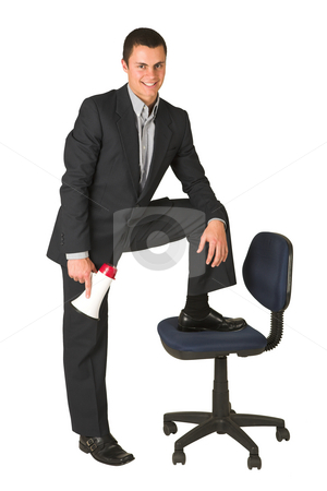 To use this stock image in your creative project, please select the size you need over to the right and click the "Add to Cart" button.
Your downloaded image will come with the Cutcaster watermark removed so don’t worry about the watermark you see on this page. Businessman #252 stock photo, Businessman wearing a suit and a grey shirt. Making a stunt on an office chair with a megaphone in his hand. by Sean Nel
