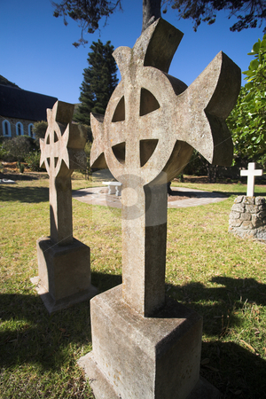 To use this stock image in your creative project, please select the size you need over to the right and click the "Add to Cart" button.
Your downloaded image will come with the Cutcaster watermark removed so don’t worry about the watermark you see on this page. Headstone grave marker stock photo, Irish Cross shaped old headstone of a grave made from granite by Sean Nel