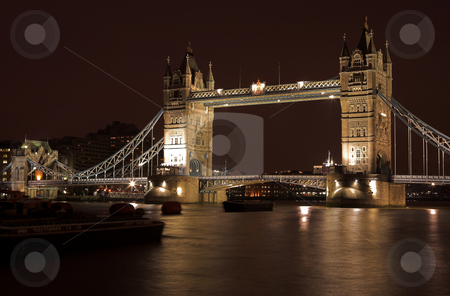 To use this stock image in your creative project, please select the size you need over to the right and click the "Add to Cart" button.
Your downloaded image will come with the Cutcaster watermark removed so don’t worry about the watermark you see on this page. Tower Bridge #4 stock photo, The bascule Tower bridge in London, Night Scene over the Thames by Sean Nel
