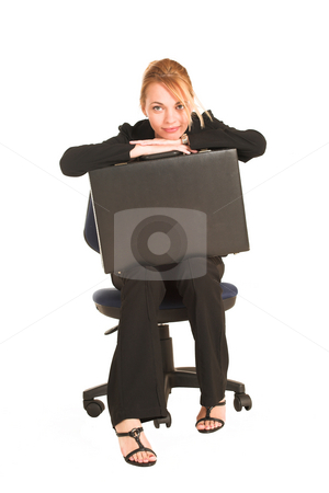 To use this stock image in your creative project, please select the size you need over to the right and click the "Add to Cart" button.
Your downloaded image will come with the Cutcaster watermark removed so don’t worry about the watermark you see on this page. Businesswoman #257 stock photo, Blonde business lady in formal black suit. Sitting on a office chair, with a black leather suitcase on her lap by Sean Nel