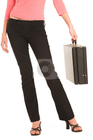 To use this stock image in your creative project, please select the size you need over to the right and click the "Add to Cart" button.
Your downloaded image will come with the Cutcaster watermark removed so don’t worry about the watermark you see on this page. Business Woman #424 stock photo, Business woman in an informal light pink shirt, black pants and high heel shoes. Holding a leather suitcase. by Sean Nel