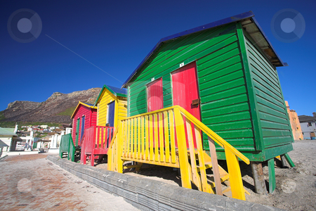 To use this stock image in your creative project, please select the size you need over to the right and click the "Add to Cart" button.
Your downloaded image will come with the Cutcaster watermark removed so don’t worry about the watermark you see on this page. Muizenberg beach #1 stock photo, Multi-colored dressing rooms on the beach at Surfers Corner, Muizenberg, South Africa by Sean Nel