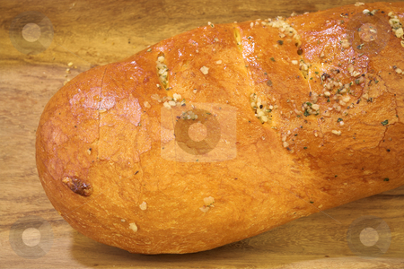 To use this stock image in your creative project, please select the size you need over to the right and click the "Add to Cart" button.
Your downloaded image will come with the Cutcaster watermark removed so don’t worry about the watermark you see on this page. Bread #6 stock photo, Loaf of bread on wooden plank by Sean Nel