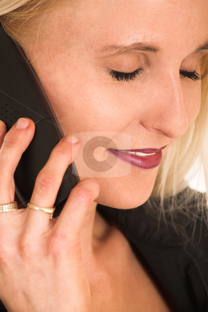 To use this stock image in your creative project, please select the size you need over to the right and click the "Add to Cart" button.
Your downloaded image will come with the Cutcaster watermark removed so don’t worry about the watermark you see on this page. Businesswoman#367 stock photo, Blond Business Woman, eyes closed, talking on phone, smiling by Sean Nel