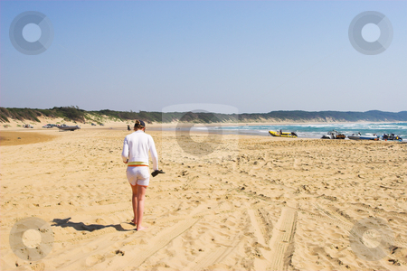 To use this stock image in your creative project, please select the size you need over to the right and click the "Add to Cart" button.
Your downloaded image will come with the Cutcaster watermark removed so don’t worry about the watermark you see on this page. Sudwana #11 stock photo, A woman walking on the beach. by Sean Nel
