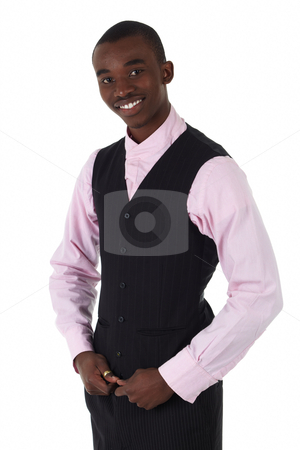 To use this stock image in your creative project, please select the size you need over to the right and click the "Add to Cart" button.
Your downloaded image will come with the Cutcaster watermark removed so don’t worry about the watermark you see on this page. Black African businessman stock photo, Young Adult black african businessman wearing a dark smart-casual outfit without a Jacket, but with a pink shirt and a dark waistcoat on a white background in various poses with various facial expressions. Part of a series, Not Isolated. by Sean Nel