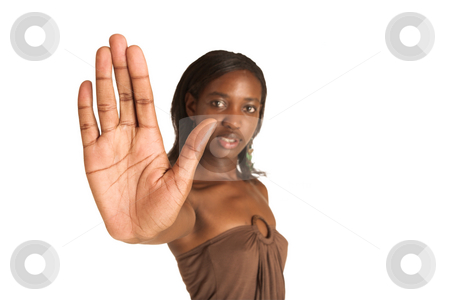 To use this stock image in your creative project, please select the size you need over to the right and click the "Add to Cart" button.
Your downloaded image will come with the Cutcaster watermark removed so don’t worry about the watermark you see on this page. Cynthia Akva #16 stock photo, African business woman dressed in neutral coloured clothes. Hand showing stop. Copy space by Sean Nel
