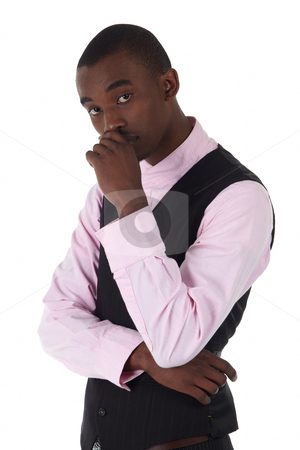 To use this stock image in your creative project, please select the size you need over to the right and click the "Add to Cart" button.
Your downloaded image will come with the Cutcaster watermark removed so don’t worry about the watermark you see on this page. Black African businessman stock photo, Young Adult black african businessman wearing a dark smart-casual outfit without a Jacket, but with a pink shirt and a dark waistcoat on a white background in various poses with various facial expressions. Part of a series, Not Isolated. by Sean Nel