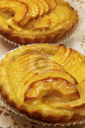 To use this stock image in your creative project, please select the size you need over to the right and click the "Add to Cart" button.
Your downloaded image will come with the Cutcaster watermark removed so don’t worry about the watermark you see on this page. Pastry #07 stock photo, Glazed French pastry in a patisserie by Sean Nel