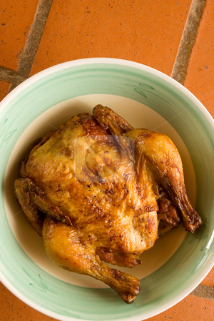 To use this stock image in your creative project, please select the size you need over to the right and click the "Add to Cart" button.
Your downloaded image will come with the Cutcaster watermark removed so don’t worry about the watermark you see on this page. Chicken #4 stock photo, Prepared whole chicken on a plate, tile background by Sean Nel