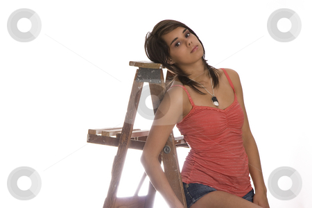 To use this stock image in your creative project, please select the size you need over to the right and click the "Add to Cart" button.
Your downloaded image will come with the Cutcaster watermark removed so don’t worry about the watermark you see on this page. Very tired stock photo, Teen girl sitting on a wood ladder, leaning her head on the top step looking very tired by Yann Poirier