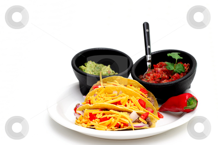 To use this stock image in your creative project, please select the size you need over to the right and click the "Add to Cart" button.
Your downloaded image will come with the Cutcaster watermark removed so don’t worry about the watermark you see on this page. Hard Shell Taco stock photo, Three hard shell tacos on a white plate with sides of tomato and chili salsa and fresh guacamole isolated on a light colored background by Lynn Bendickson