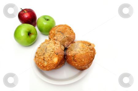 To use this stock image in your creative project, please select the size you need over to the right and click the "Add to Cart" button.
Your downloaded image will come with the Cutcaster watermark removed so don’t worry about the watermark you see on this page. Apple Muffin stock photo, Fruit muffins on a white plate with red and green apples on the side by Lynn Bendickson