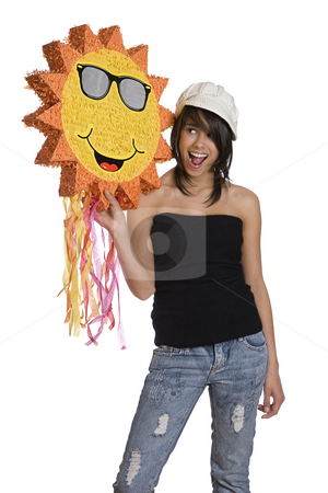 To use this stock image in your creative project, please select the size you need over to the right and click the "Add to Cart" button.
Your downloaded image will come with the Cutcaster watermark removed so don’t worry about the watermark you see on this page. Happy sunny teen stock photo, Teenage girl wearing a black tube top, knitted hat and jeans with holes holding a sunny pinata by Yann Poirier