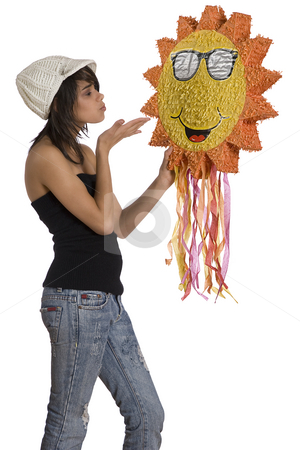 To use this stock image in your creative project, please select the size you need over to the right and click the "Add to Cart" button.
Your downloaded image will come with the Cutcaster watermark removed so don’t worry about the watermark you see on this page. Kissing the sun stock photo, Teenage girl wearing a black tube top, knitted hat and jeans with holes holding a sunny pinata by Yann Poirier