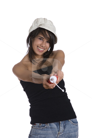 To use this stock image in your creative project, please select the size you need over to the right and click the "Add to Cart" button.
Your downloaded image will come with the Cutcaster watermark removed so don’t worry about the watermark you see on this page. Spraying ketchup stock photo, Teenage girl wearing a black tube top, knitted hat and jeans with holes squeezing a ketchup bottle by Yann Poirier