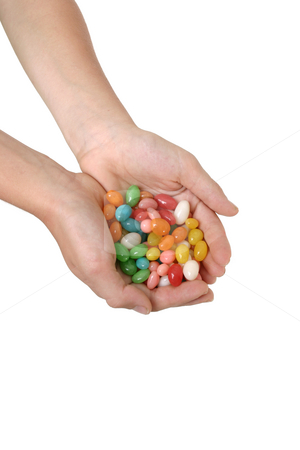 To use this stock image in your creative project, please select the size you need over to the right and click the "Add to Cart" button.
Your downloaded image will come with the Cutcaster watermark removed so don’t worry about the watermark you see on this page. Handful of jelly beans stock photo, A child holds a handful of coloured lollies / candy. by Leah-Anne Thompson