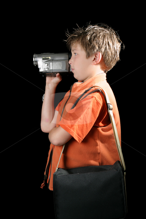 To use this stock image in your creative project, please select the size you need over to the right and click the "Add to Cart" button.
Your downloaded image will come with the Cutcaster watermark removed so don’t worry about the watermark you see on this page. Creating home movies stock photo, A child using a digital video camera to record a home movie. by Leah-Anne Thompson