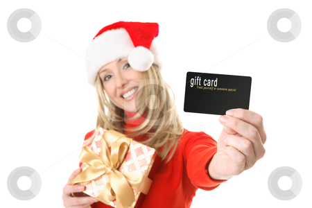 To use this stock image in your creative project, please select the size you need over to the right and click the "Add to Cart" button.
Your downloaded image will come with the Cutcaster watermark removed so don’t worry about the watermark you see on this page. Woman holding gift card, credit card etc stock photo, A woman holding a gift and outstretched arm showing a gift card, credit card or other card or object. Focus is the hand and card. Change the card or text to suit your needs. by Leah-Anne Thompson