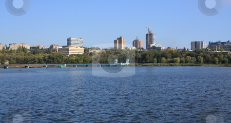 To use this stock image in your creative project, please select the size you need over to the right and click the "Add to Cart" button.
Your downloaded image will come with the Cutcaster watermark removed so don’t worry about the watermark you see on this page. Construction of the house stock photo, New buildings near the central city pond by Valerij Kotulskij