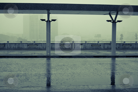 To use this stock image in your creative project, please select the size you need over to the right and click the "Add to Cart" button.
Your downloaded image will come with the Cutcaster watermark removed so don’t worry about the watermark you see on this page. Rainy day in the city airport stock photo, Heavy tropical rain and empty Asian airport parking by Pavel Filippov
