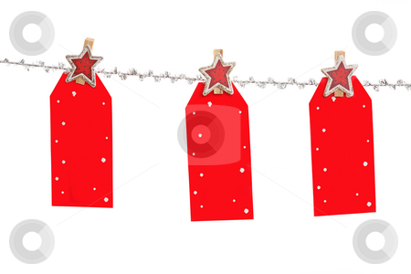 To use this stock image in your creative project, please select the size you need over to the right and click the "Add to Cart" button.
Your downloaded image will come with the Cutcaster watermark removed so don’t worry about the watermark you see on this page. Christmas Tags stock photo, Three Christmas tag hang from silver line. , blank with space for your own message. by Leah-Anne Thompson