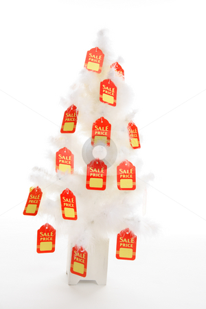 To use this stock image in your creative project, please select the size you need over to the right and click the "Add to Cart" button.
Your downloaded image will come with the Cutcaster watermark removed so don’t worry about the watermark you see on this page. Christmas Sales stock photo, Red and yellow sale tags hang from a white Christmas tree. concept. Change it to suit your needs. by Leah-Anne Thompson
