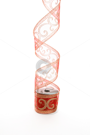 To use this stock image in your creative project, please select the size you need over to the right and click the "Add to Cart" button.
Your downloaded image will come with the Cutcaster watermark removed so don’t worry about the watermark you see on this page. Curling red gold ribbon stock photo, Curling red gauze ribbon decorated with gold glitterr swirls. For wrapping and decorating presents and gifts. by Leah-Anne Thompson