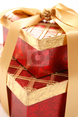 To use this stock image in your creative project, please select the size you need over to the right and click the "Add to Cart" button.
Your downloaded image will come with the Cutcaster watermark removed so don’t worry about the watermark you see on this page. Red and gold gift closeup stock photo, Red and gold gifts closeup with shallow dof. by Leah-Anne Thompson