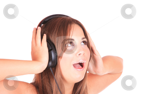 To use this stock image in your creative project, please select the size you need over to the right and click the "Add to Cart" button.
Your downloaded image will come with the Cutcaster watermark removed so don’t worry about the watermark you see on this page. Listening to Music stock photo, Beautiful young woman Listening to Music by Remy Musser
