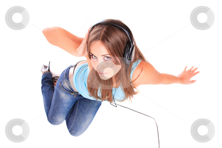 To use this stock image in your creative project, please select the size you need over to the right and click the "Add to Cart" button.
Your downloaded image will come with the Cutcaster watermark removed so don’t worry about the watermark you see on this page. Listening to Music stock photo, Beautiful young woman Listening to Music by Remy Musser